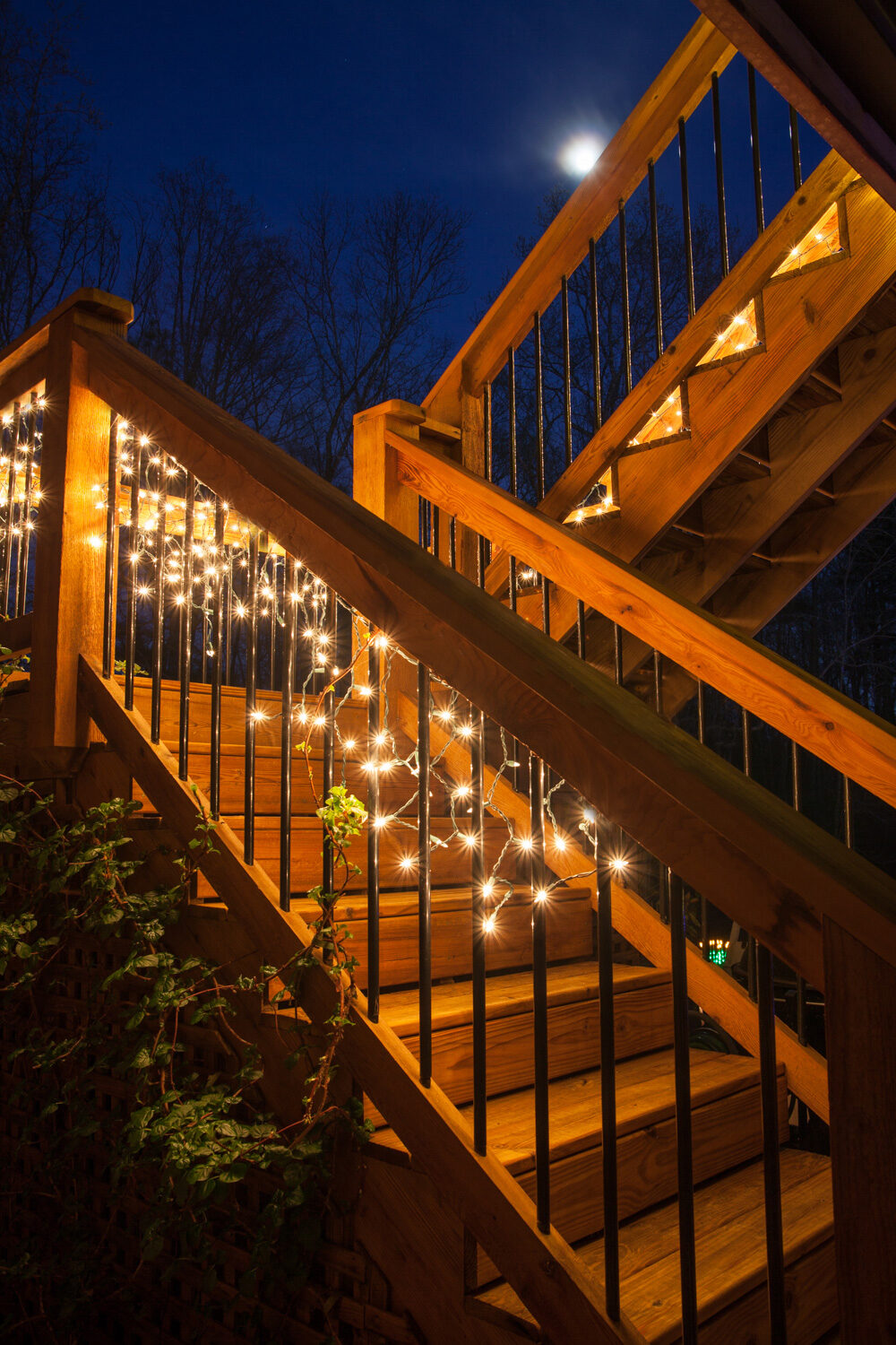 Zenith Builders's recent project, an open-air wooden gazebo with a stunning vaulted ceiling, showcasing natural pine boards and recessed lighting. The craftsmanship accentuates the inviting ambiance of this outdoor entertainment area